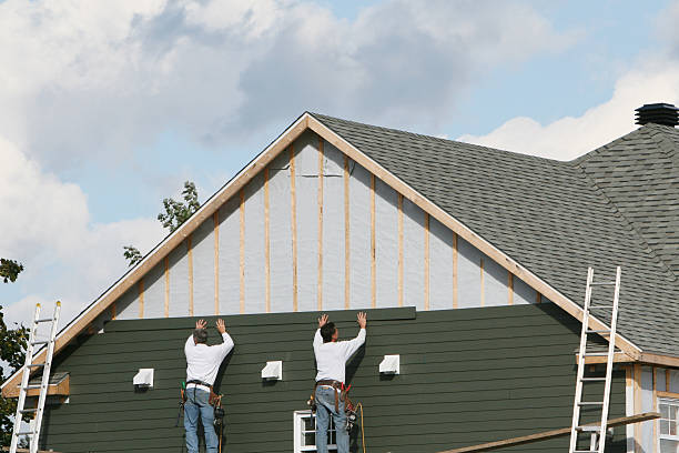Professional Siding technician working in West Milton, PA